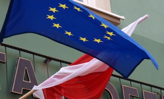 EU-flag-over-Polsk-flag